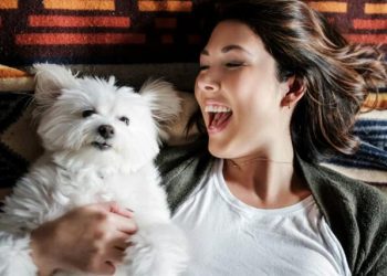 Letting your pet sleep in your bed may be just what the doctor ordered